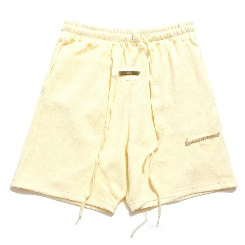 ESSENTIALS Beige Shorts: Unisex, Breathable, Minimalist Casual