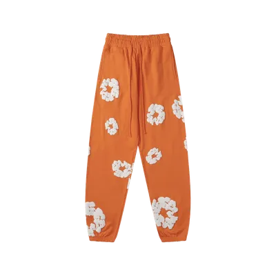 Denim Tears Orange Floral Sweatpants: Unisex Streetwear
