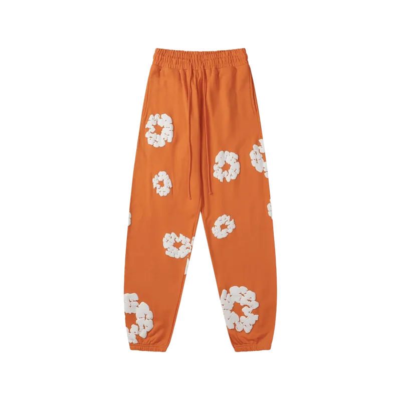 Denim Tears Orange Floral Sweatpants: Unisex Streetwear